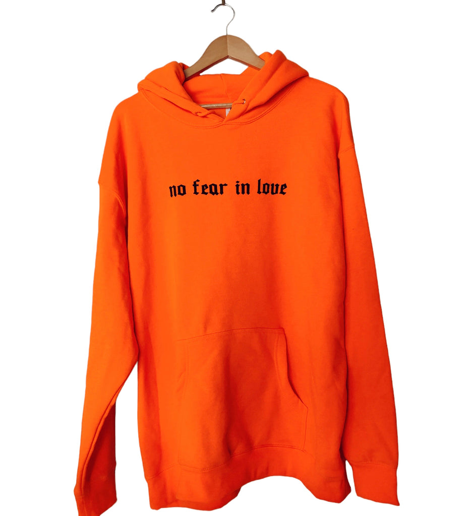NO FEAR IN LOVE NEON ORANGE HOODIE