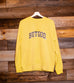 BUT GOD YELLOW CREWNECK SWEATSHIRT
