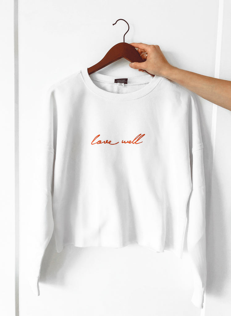 LOVE WELL WHITE DISTRESSED BOXY SWEATSHIRT