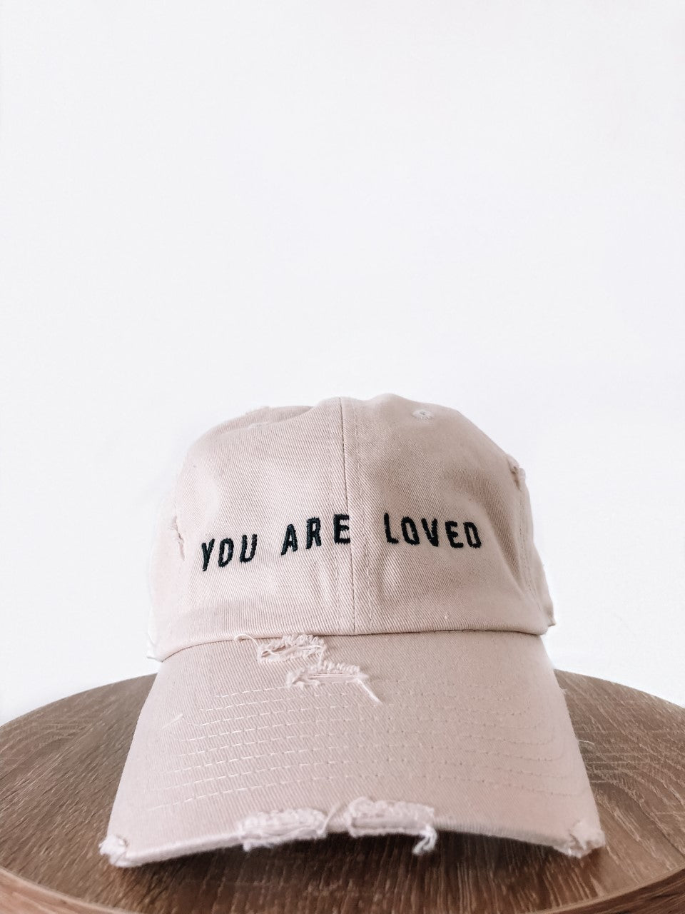 HE ROSE DISTRESSED BEIGE CAP